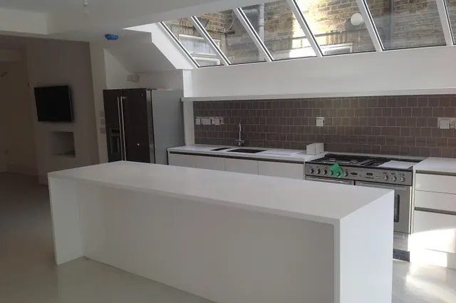 Island and range beneath the run of roof glazing