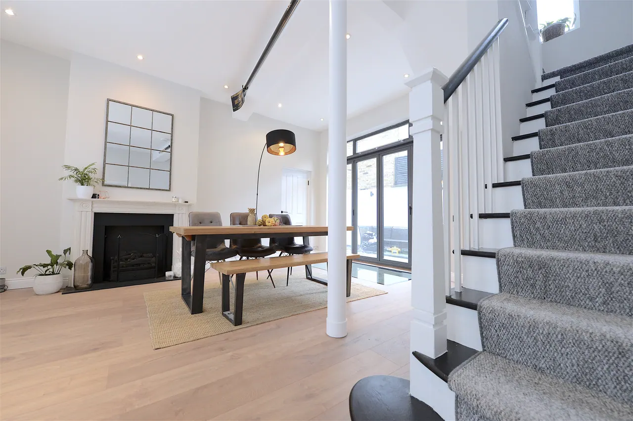 Dining room, chimneypiece retained, looking back to the stair